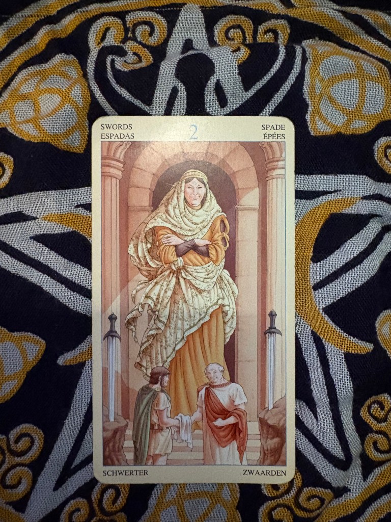 The Two of Swords card from Universal Goddess Tarot deck.